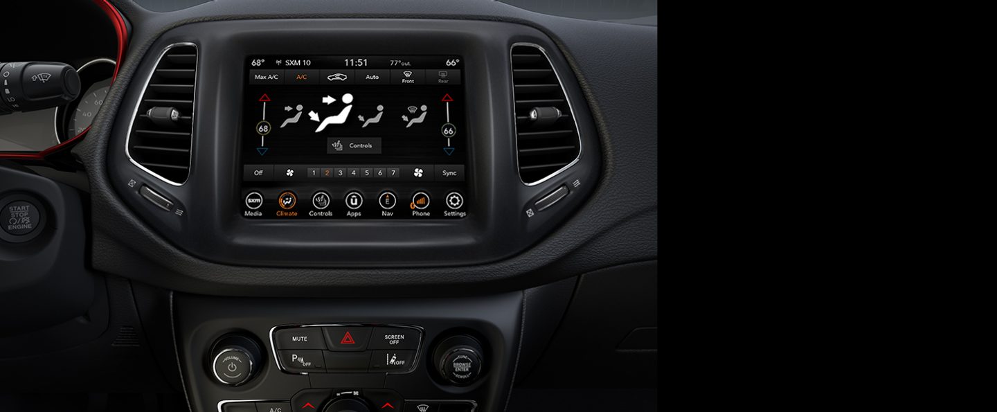 The Dual-Zone Automatic Temperature Controls on the Uconnect touchscreen and the center stack in the 2020 Jeep Compass.