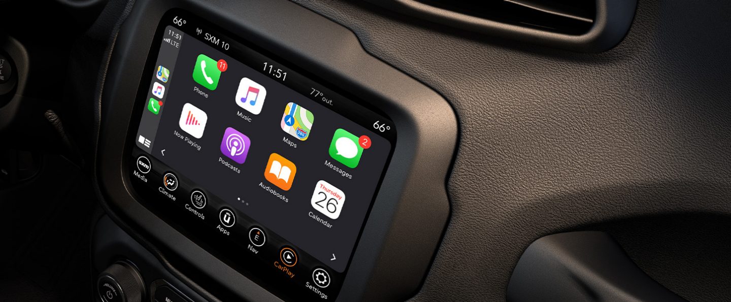 A close-up of the Uconnect touchscreen on the 2021 Jeep Renegade with a variety of selections displayed.